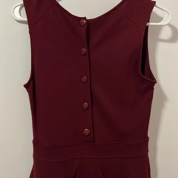 3/$20. Burgundy Peplum Dress - Picture 5 of 9